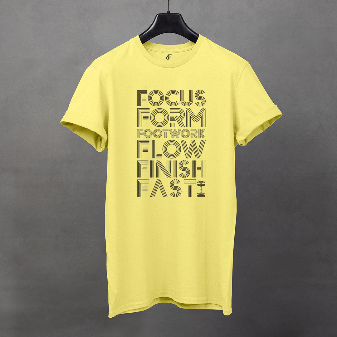 Corn silk, yellow, t-shirt featuring stacked black text: Focus, Form, Footwork, Flow, Finish, Fast – clean rectangular line design for athletes focused on performance fundamentals